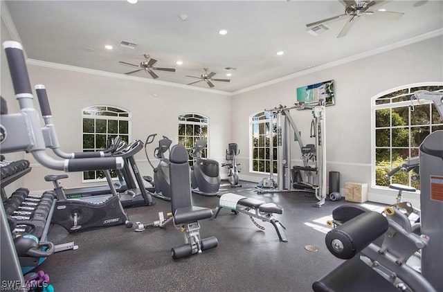 workout area featuring visible vents, crown molding, and recessed lighting