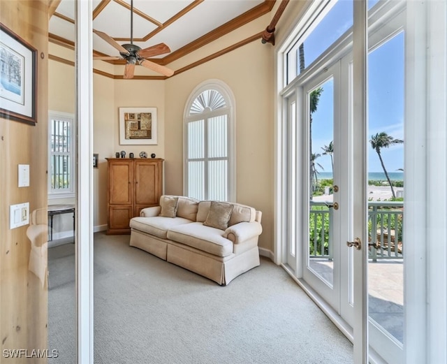11550 Paige Ct, Captiva, FL 33924 - interior space featuring baseboards, ornamental molding, a ceiling fan, carpet floors, and french doors