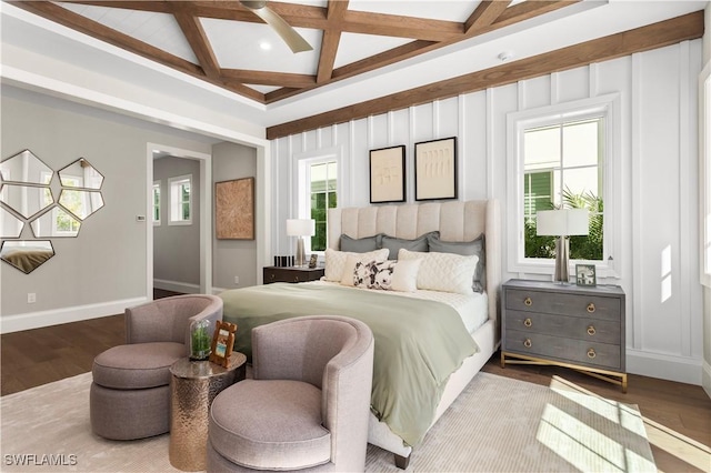 bedroom with beam ceiling, wood finished floors, baseboards, and coffered ceiling