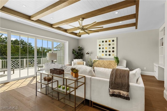 living room with beam ceiling, recessed lighting, baseboards, and hardwood / wood-style floors