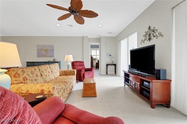 living area with a ceiling fan, recessed lighting, and visible vents