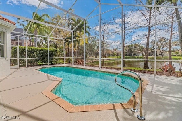 outdoor pool featuring a water view, glass enclosure, and a patio