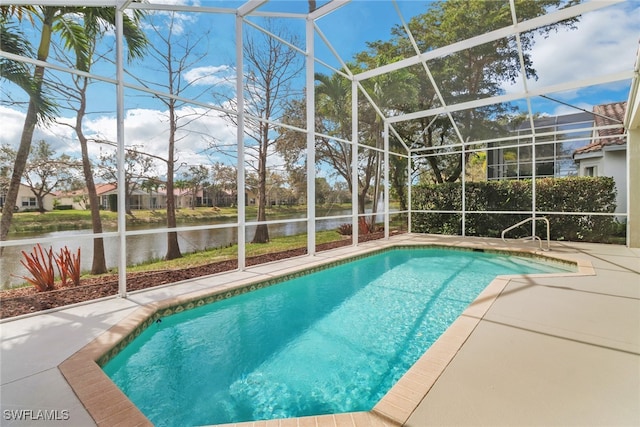 outdoor pool with a lanai, a water view, and a patio