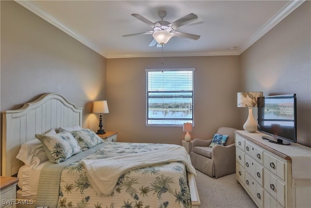 bedroom with ceiling fan, crown molding, and light colored carpet