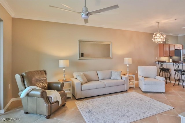 tiled living room featuring ceiling fan and crown molding