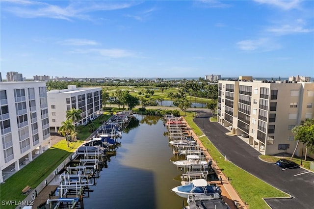 birds eye view of property featuring a water view