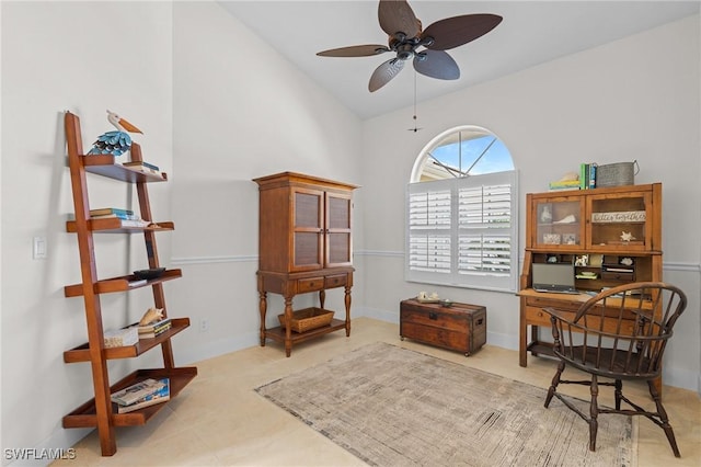 sitting room with lofted ceiling and ceiling fan