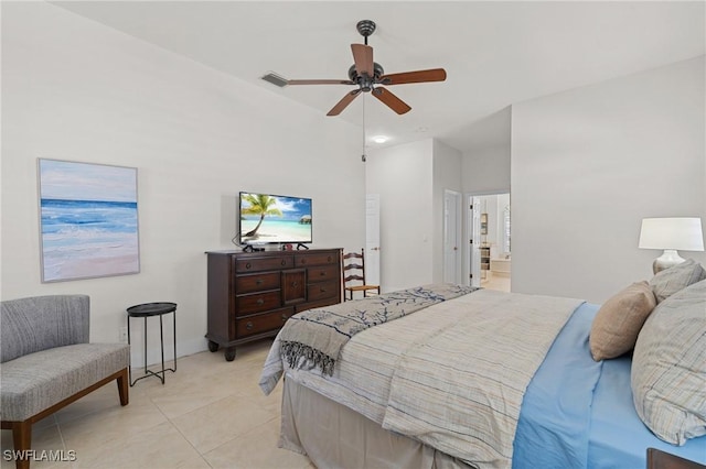 bedroom featuring a ceiling fan, visible vents, and light tile patterned floors