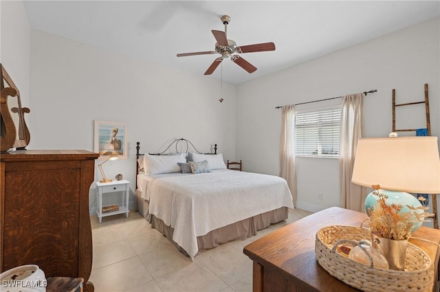 522 SW 51st Ter, Cape Coral, FL 33914 - bedroom with a ceiling fan and light tile patterned floors