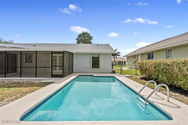 view of pool featuring french doors