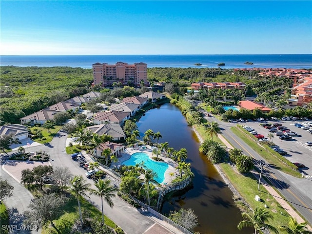 drone / aerial view with a water view