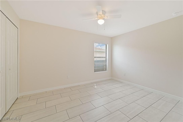 spare room featuring ceiling fan