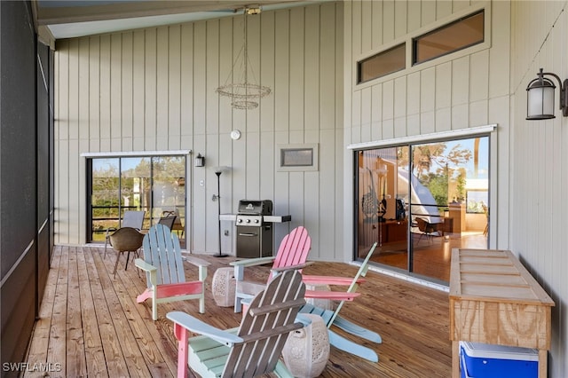 wooden deck with grilling area