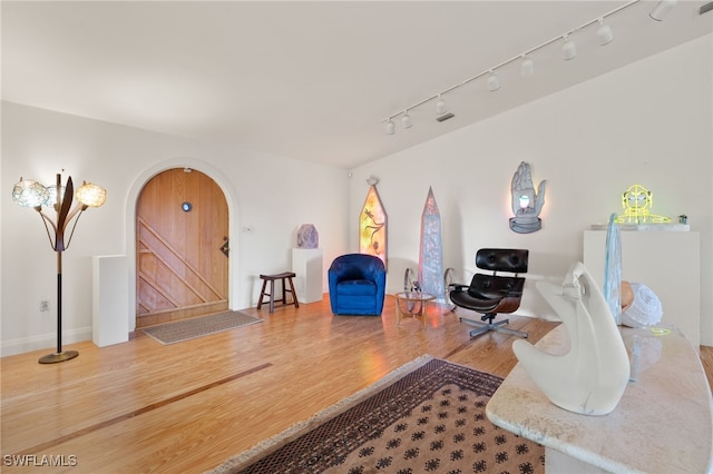 sitting room featuring hardwood / wood-style floors