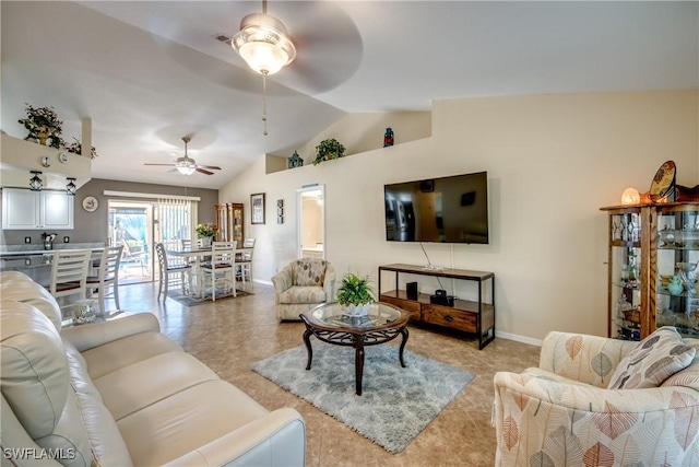 living area featuring lofted ceiling, light tile patterned floors, a ceiling fan, and baseboards