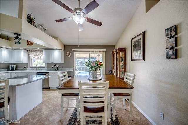 kitchen with light tile patterned floors, visible vents, white cabinets, light countertops, and stainless steel dishwasher