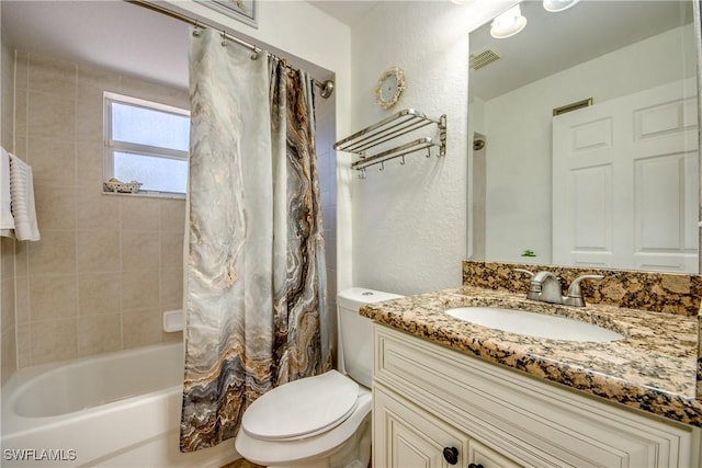 bathroom with visible vents, a textured wall, toilet, shower / tub combo, and vanity