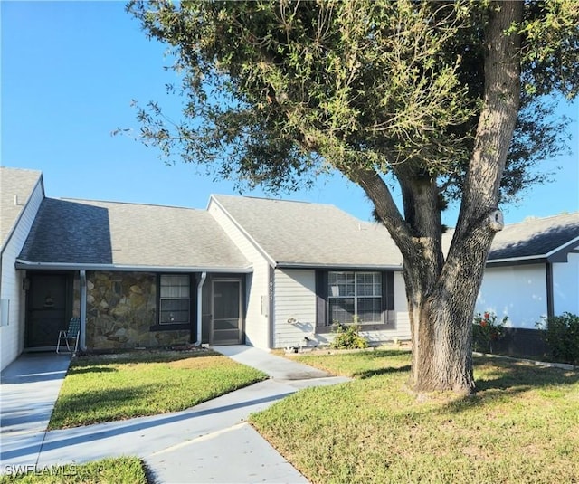 ranch-style house with a front yard