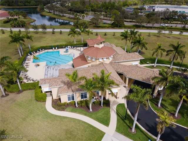 birds eye view of property featuring a water view