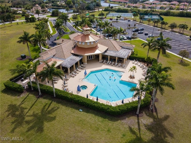 view of swimming pool with a patio