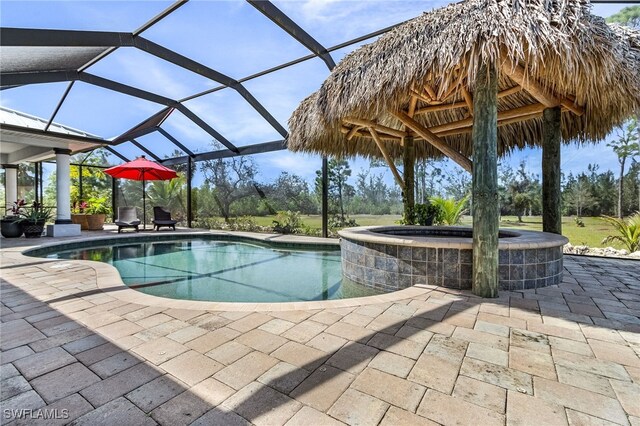 15791 Quail Trl, Bokeelia, FL 33922 - view of pool with a patio area, a gazebo, and glass enclosure