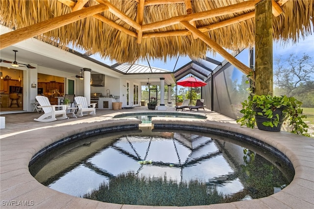 15791 Quail Trl, Bokeelia, FL 33922 - view of swimming pool featuring a lanai, a patio area, and a ceiling fan
