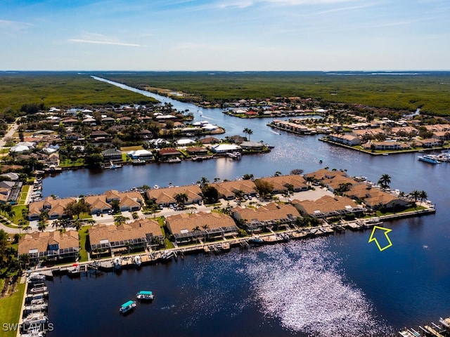 bird's eye view with a water view