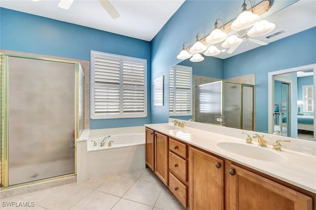 bathroom featuring tile patterned floors, a sink, and ceiling fan