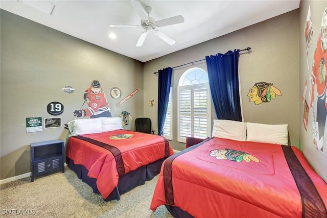 bedroom with carpet floors, ceiling fan, and baseboards