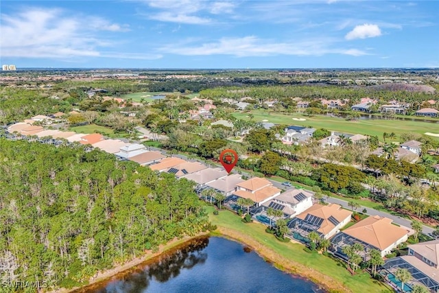 aerial view with view of golf course, a water view, and a residential view