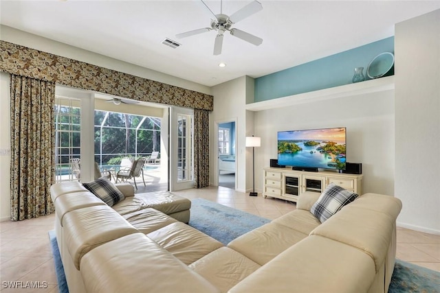 tiled living area with ceiling fan, recessed lighting, a sunroom, visible vents, and baseboards