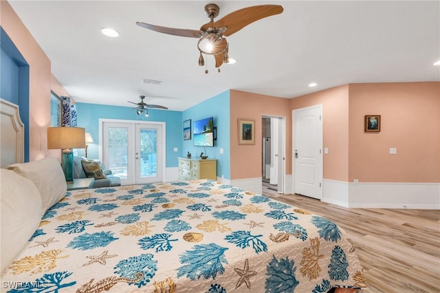 bedroom with ceiling fan, light hardwood / wood-style floors, access to outside, and french doors