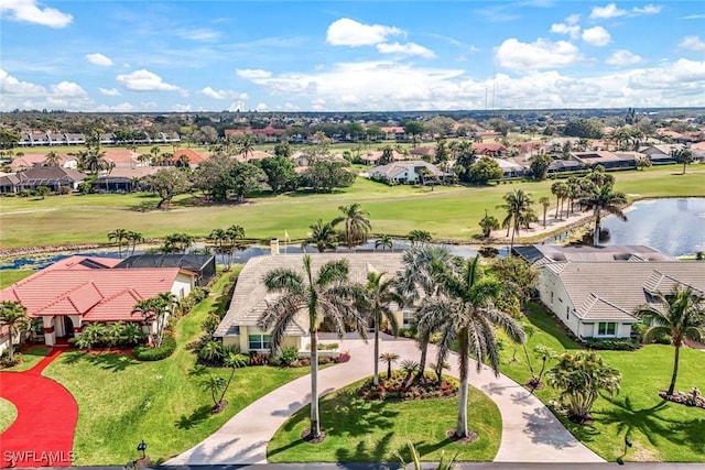 bird's eye view featuring a water view and a residential view