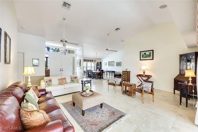 living area featuring ceiling fan, high vaulted ceiling, visible vents, and baseboards