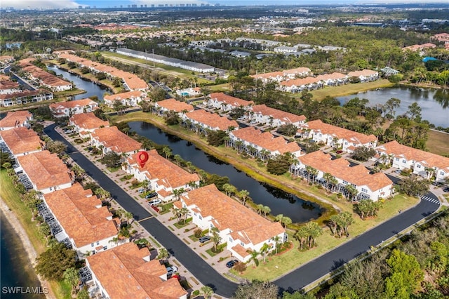 drone / aerial view featuring a water view