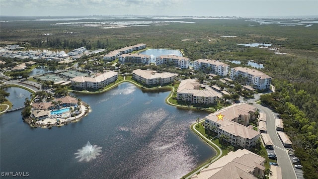 bird's eye view with a water view