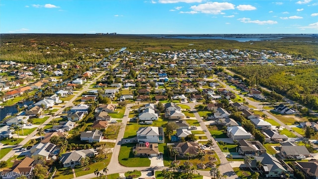 aerial view featuring a residential view and a water view