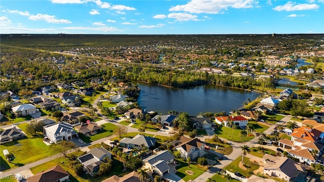 bird's eye view with a water view and a residential view