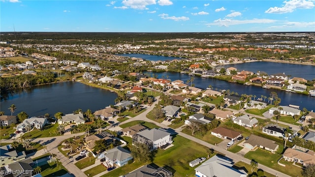 aerial view featuring a water view and a residential view