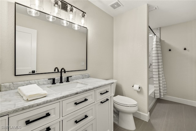 full bathroom with baseboards, visible vents, toilet, tile patterned flooring, and vanity