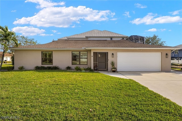 view of front facade with concrete driveway, a front lawn, and stucco siding