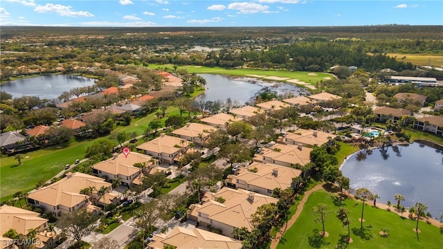 aerial view featuring a residential view and a water view