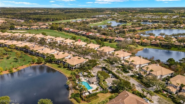 bird's eye view with a water view and a residential view