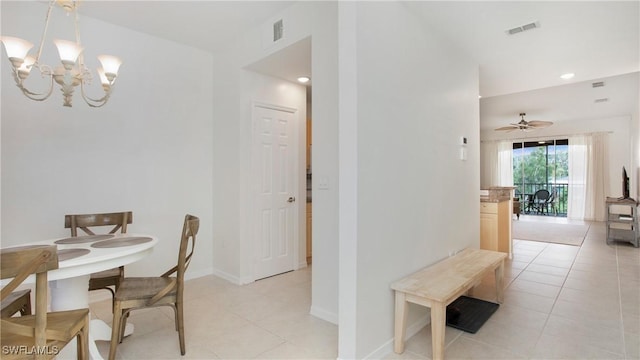 dining room featuring light tile patterned floors, baseboards, visible vents, and recessed lighting