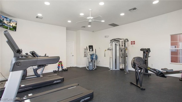 workout area with baseboards, visible vents, and recessed lighting