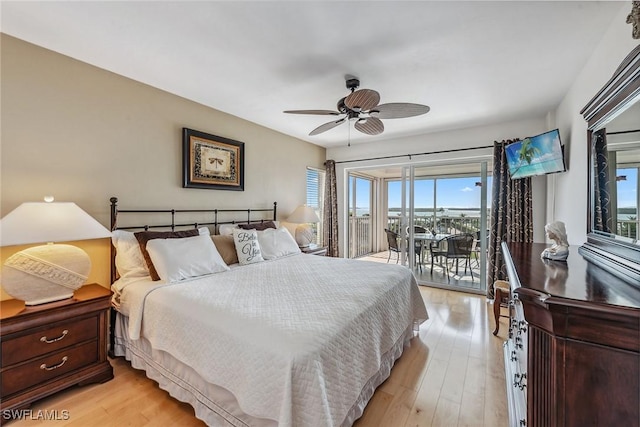 bedroom with ceiling fan, light wood finished floors, and access to outside