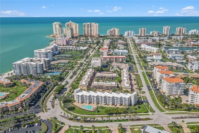 aerial view featuring a water view and a city view