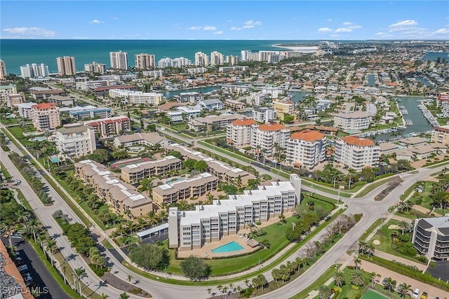 drone / aerial view with a water view and a city view