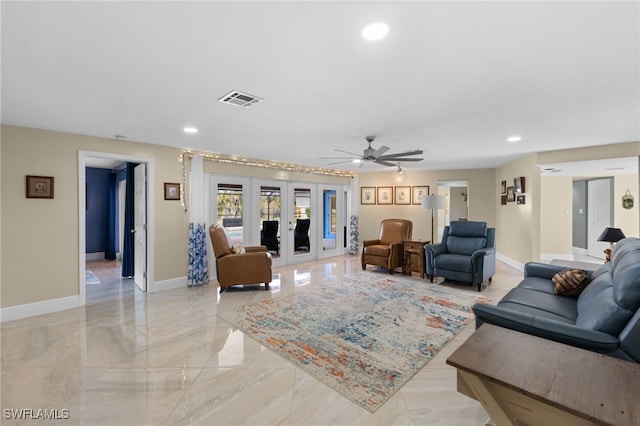 living area with baseboards, visible vents, marble finish floor, french doors, and recessed lighting