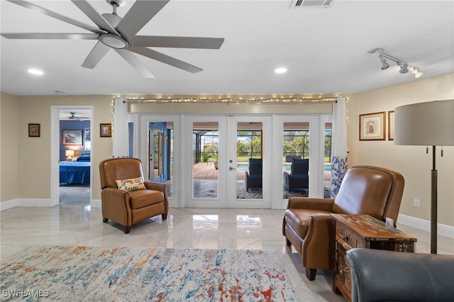 sitting room with recessed lighting, french doors, ceiling fan, and baseboards